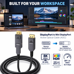 Swegltek DisplayPort to Mini DisplayPort1.4 active optical cable: workspace; display end with removable DP adapter fitted,8K60requiresDSC.